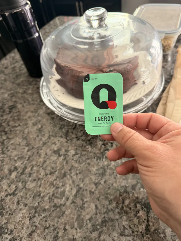 Jordan holding an Energy Que-Strips packet