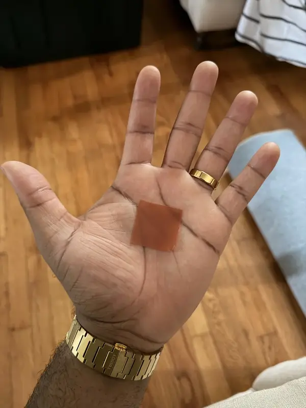 Marcus’s customer photo of a dissolvable strip in his hand