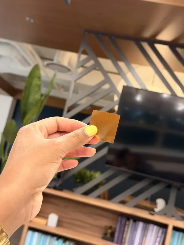 Tina’s customer photo holding a dissolvable strip